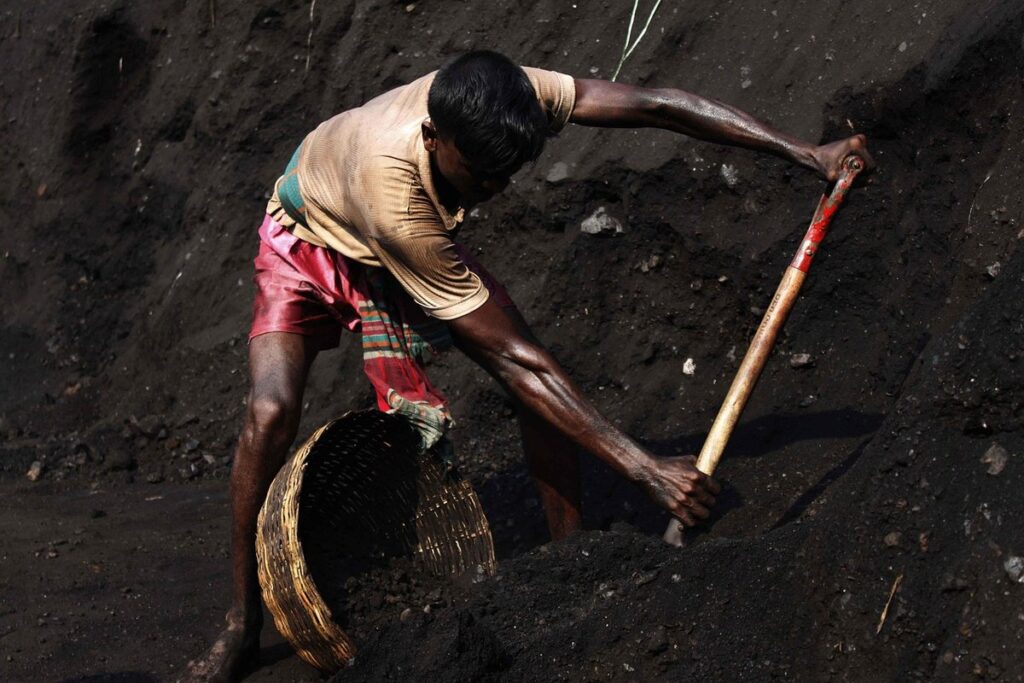 how to break up hard soil