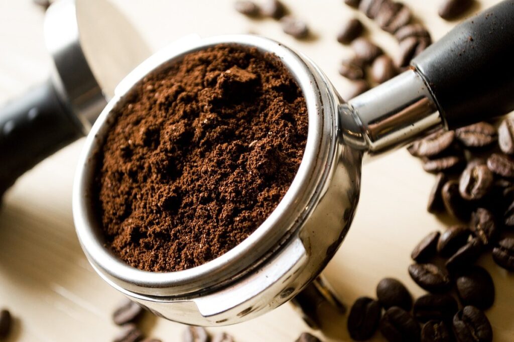 what do coffee grounds do to soil